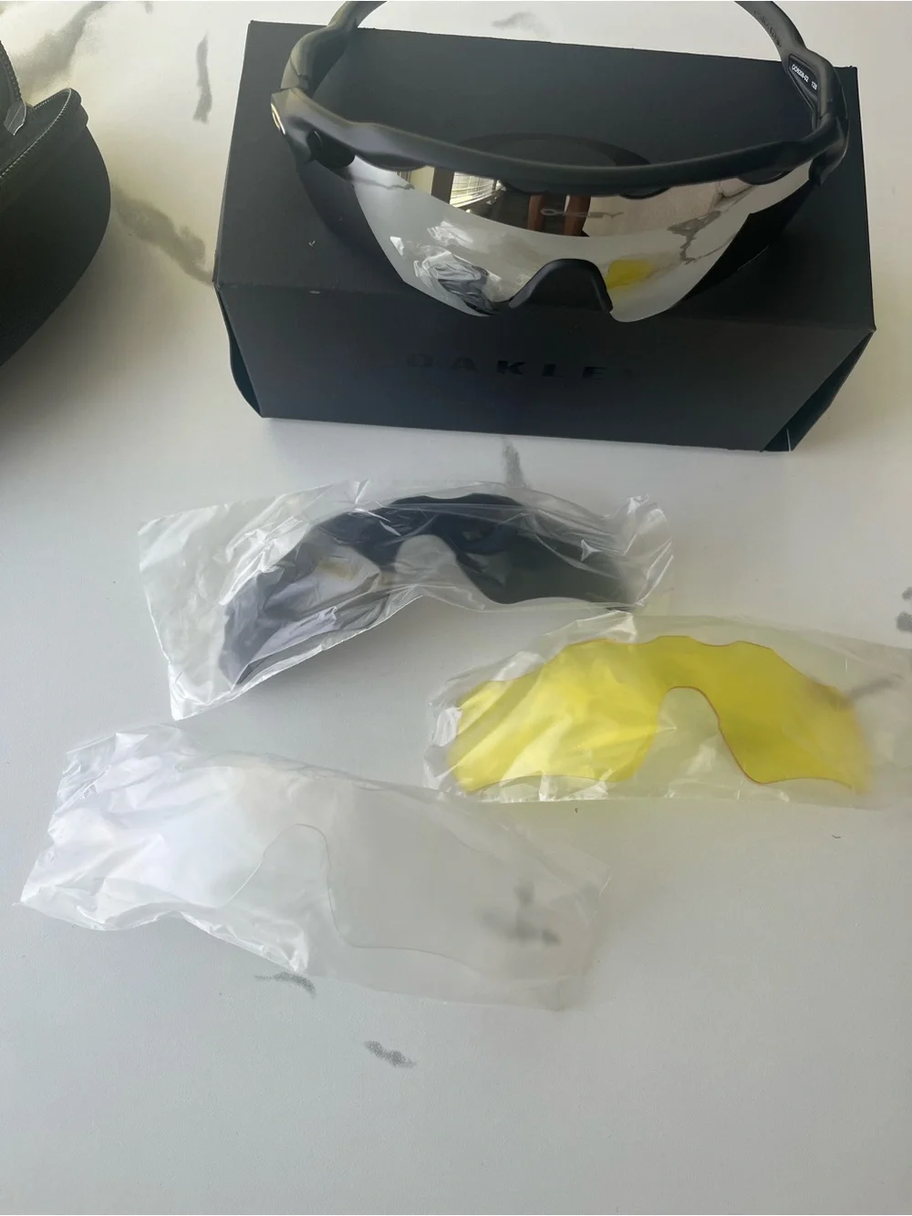Oakley Black Frame Sunglasses with Silver Mirror Lens